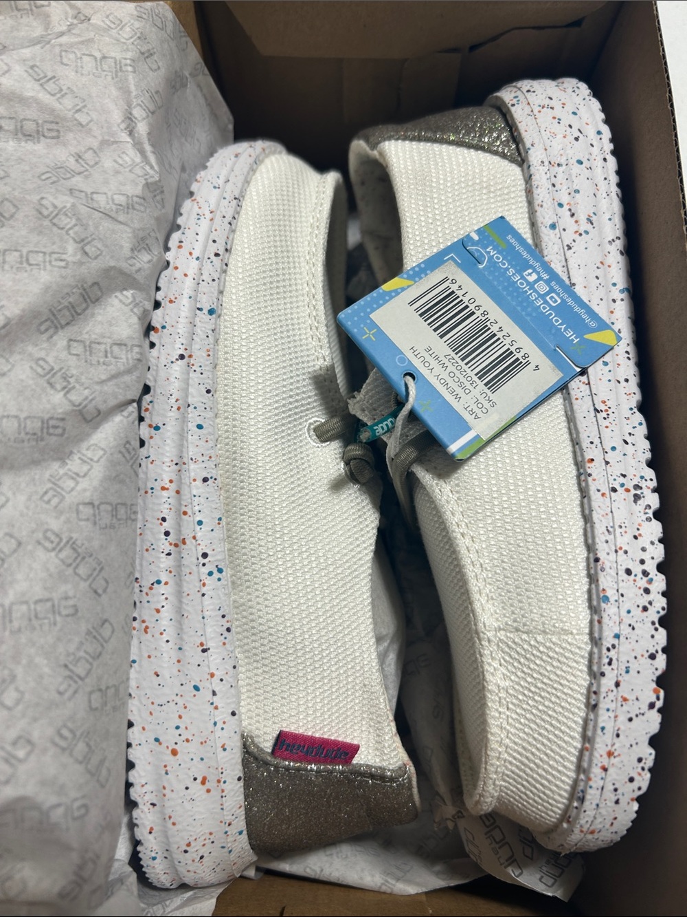 Hey Dude White Slip-On Sneakers with Multicolor Speckled Sole